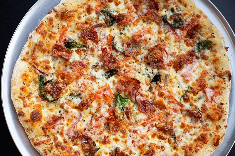 Build-your-own pizzas are available with vegan cheese blends or mozzarella and your choice of toppings such as vegan pepperoni and sausage (plus some meat toppings). - MABEL SUEN