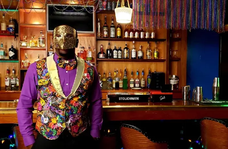 Ronnell Banks, Molly's operational manager, dresses up for opening night at Carnival. - KRISTEN FARRAH