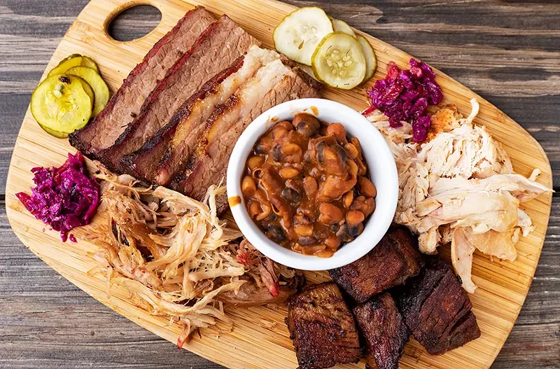One of Knockout’s combo meat platters with pit beans. - MABEL SUEN