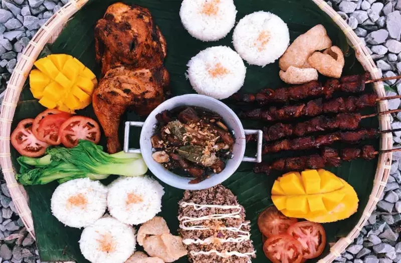 A selection of the Filipino street-food eats at the Fattened Caf pop-up. - COURTESY DARREN YOUNG AND CHARLENE LOPEZ-YOUNG