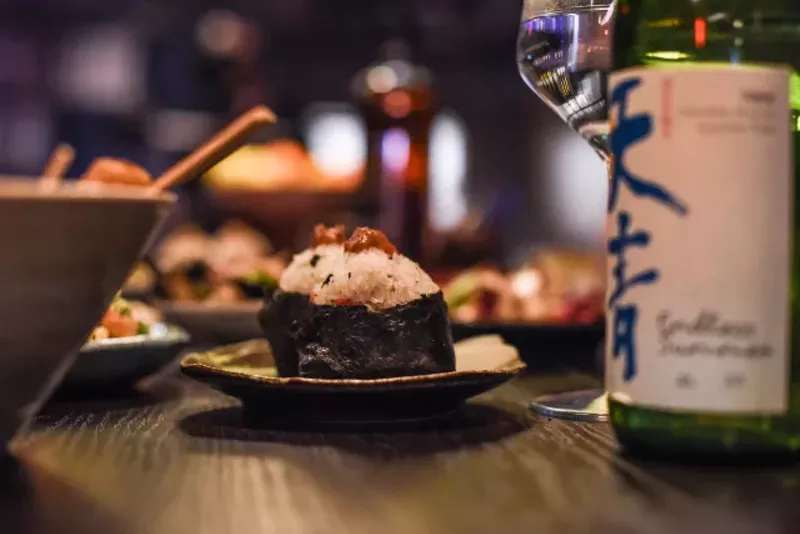 Umeboshi onigiri (pickled plum-flavored picnic rice). - TRENTON ALMGREN-DAVIS