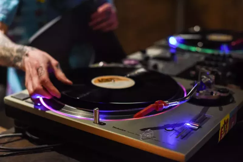 Fullerton takes a record for a spin. - TRENTON ALMGREN-DAVIS