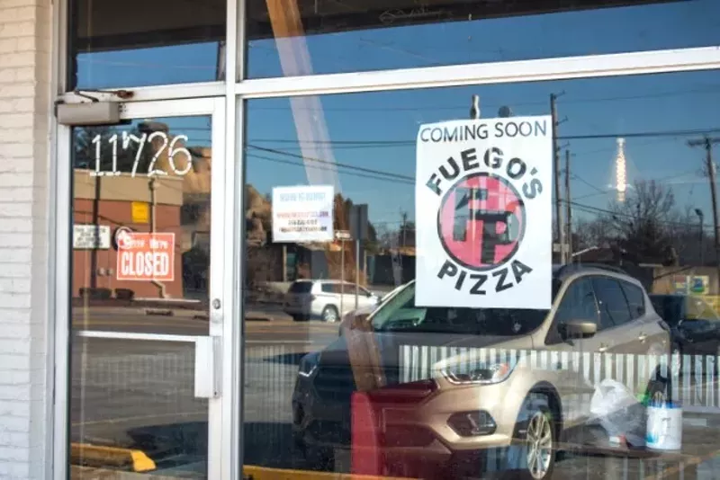 A sign announcing that Fuego's is coming soon has been posted in the window. - MONICA OBRADOVIC