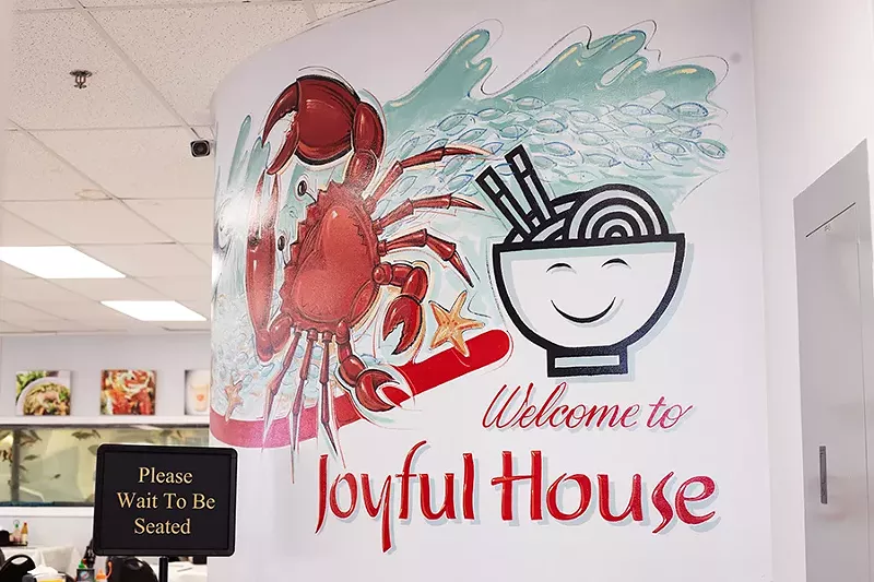 There have been a few attempts to bring character to the space, including a sea-themed mural of a fish, crab and bowl of noodles at the front door. - MABEL SUEN