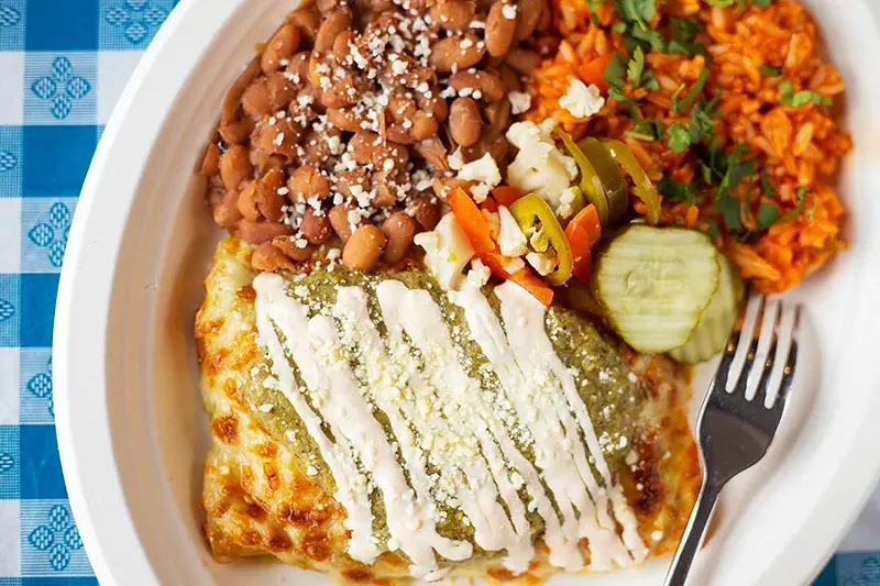 Chicken enchiladas with ricotta, cilantro and green sauce. - MABEL SUEN