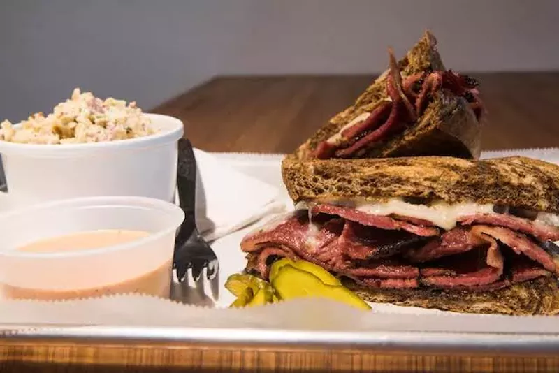 The pastrami sandwich with a side of potato salad. - TRENTON ALMGREN-DAVIS