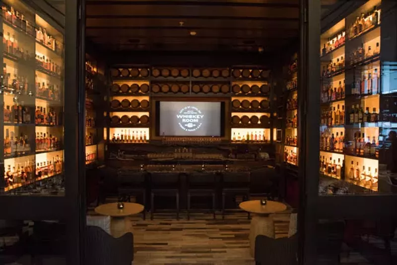 The Whiskey Room serves as a private event space and features a huge selection of bourbon, whiskey and rye at various price points. - TRENTON ALMGREN-DAVIS