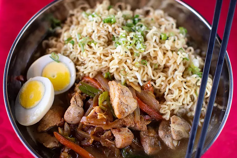 Chicken ramen with marinated chicken, cabbage, onion, carrot and scallion. - MABEL SUEN