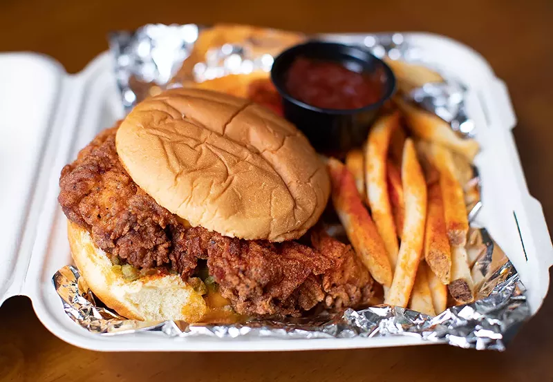 Rico chicken sandwich with hand-breaded chicken breast, signature "Rico dust" seasoning, chili oil, Valentina mayo and jalapeno-pickle relish on a potato bun. - MABEL SUEN