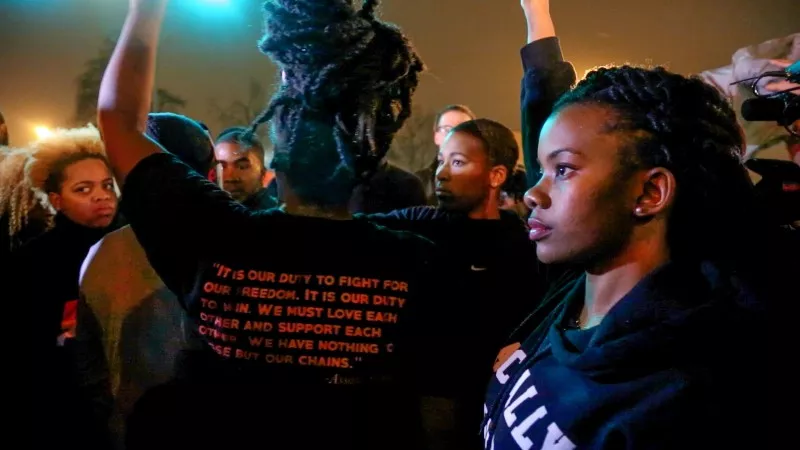 Ferguson protest leader Brittany Ferrell helped gather people together to chant, "It is our duty to fight for our freedom," during a protest in South St. Louis on Nov. 23, 2014. The chant is based on a quote by Black Power activist Assata Shakur. Before leading the chant, Activist Ashley Yates told the group, "We know Black lives matter, and we know that we must fight to prove that.” - REBECCA RIVAS/MISSOURI INDEPENDENT