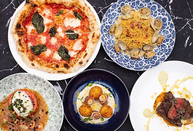 Margherita pizza, capellini and clam pasta, tomato salad, arancini and king cut sirloin. - MABEL SUEN