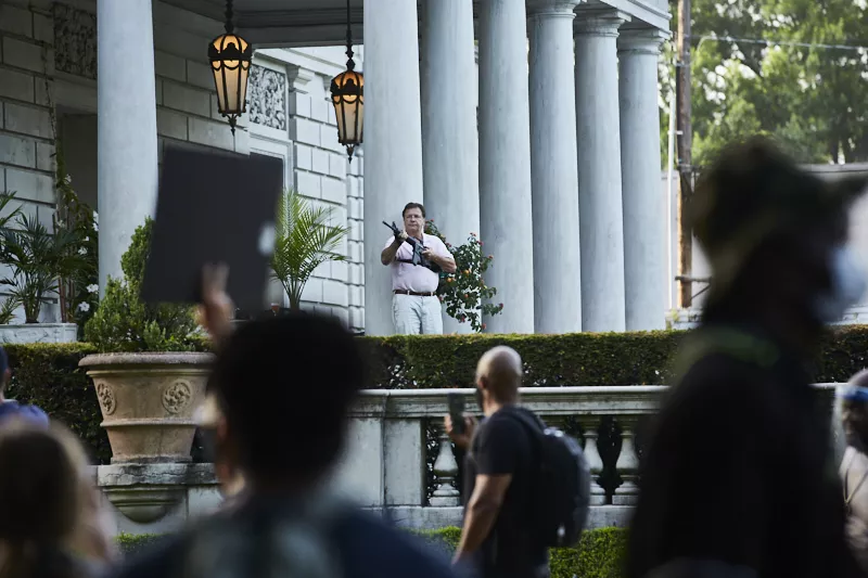 An armed Mark McCloskey on June 28, 2020, outside his house. - THEO WELLING