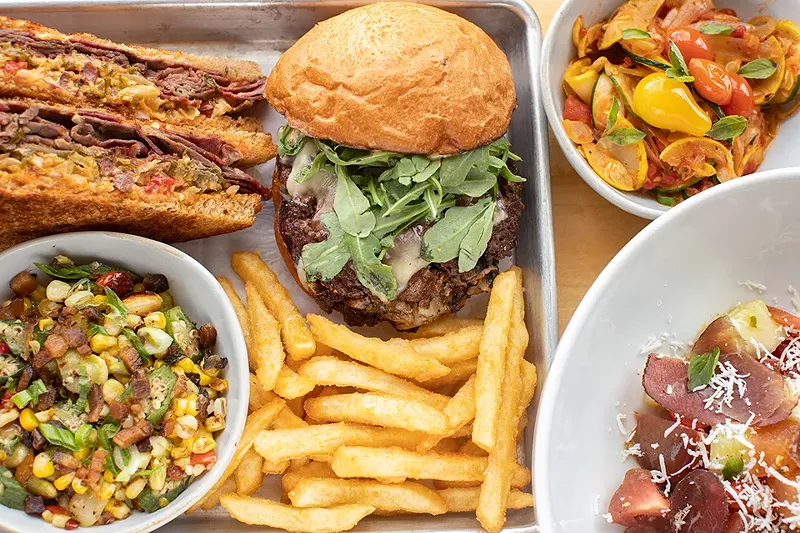 A selection of items from Bolyard's Meat & Provisions: Reuben sandwich, Umami Burger, seasonal veggies, succotash, tallow fries and the seasonal salad. - MABEL SUEN