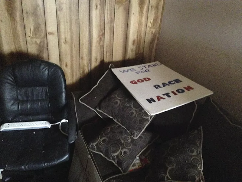 A poster at Ancona's home days after his murder. - PHOTO BY DOYLE MURPHY