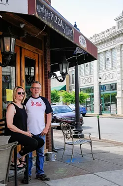 Beckie Lewis and Francis Rodriguez own two businesses on Cherokee. They're concerned about crime after an April 30 shootout. - PHOTO BY STEVE TRUESDELL