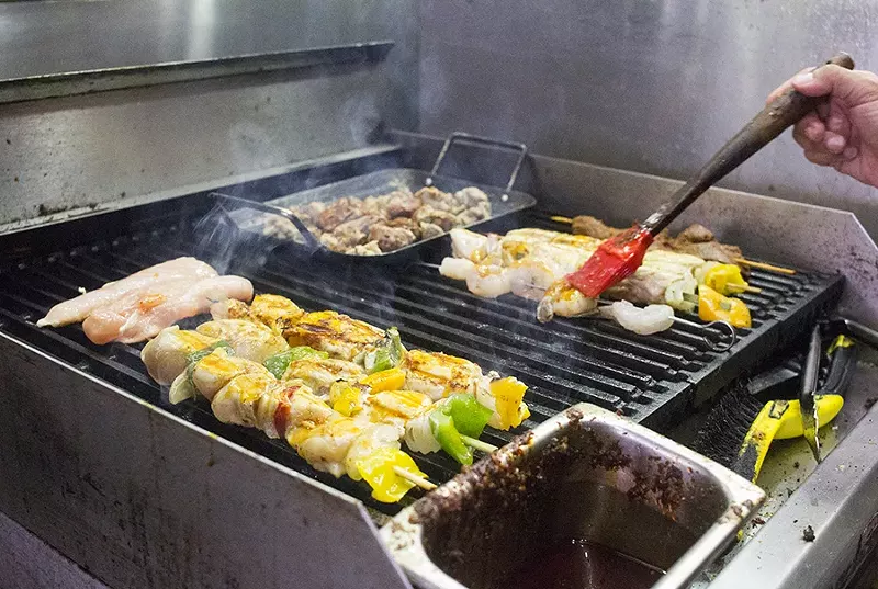 Fairview Lounge's grill gets plenty of action. - MABEL SUEN