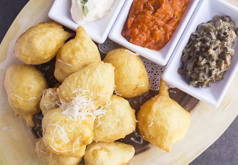 The "Balkan Dipping Board" includes ajvar, kajmak, mushroom duxelle and ustipci. - PHOTO BY MABEL SUEN
