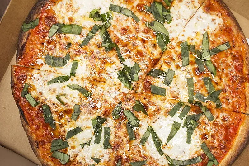"The Humble Margherita" comes with organic house red sauce, fresh mozzarella, fresh basil, an olive-oil drizzle and pink Himalayan salt. - PHOTO BY MABEL SUEN