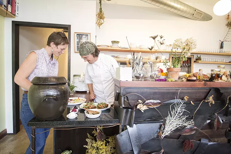 Chef-owner William Pauley examines on order. - MABEL SUEN