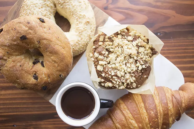Baked treats include a cinnamon-raisin bagel, sesame bagel, apple-spice muffin and croissant with chocolate sauce. - MABEL SUEN