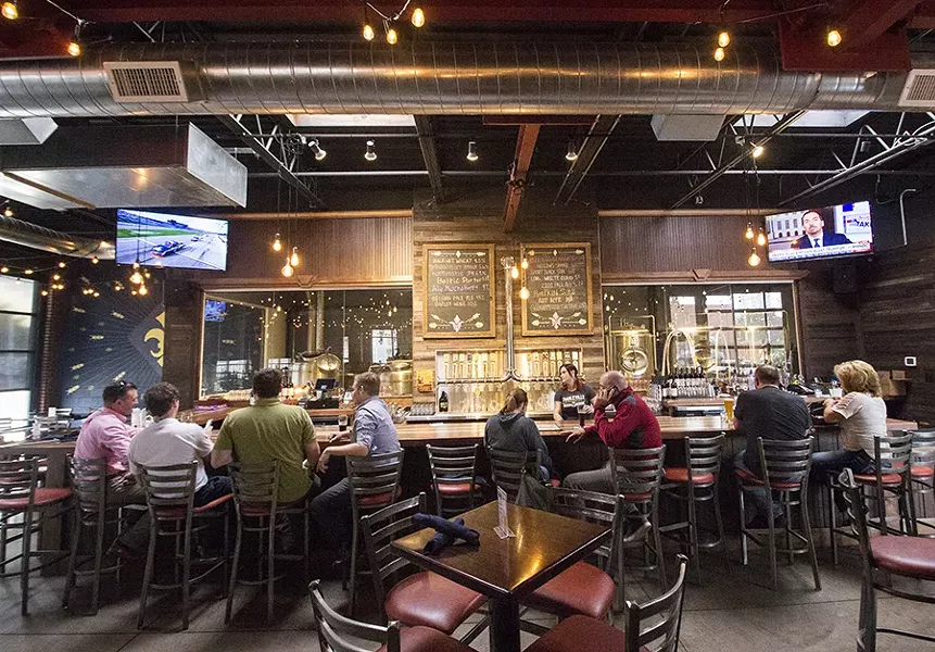 The bar and brewery occupy a multi-tiered space right across a side street from the Vin de Set complex. - PHOTO BY MABEL SUEN