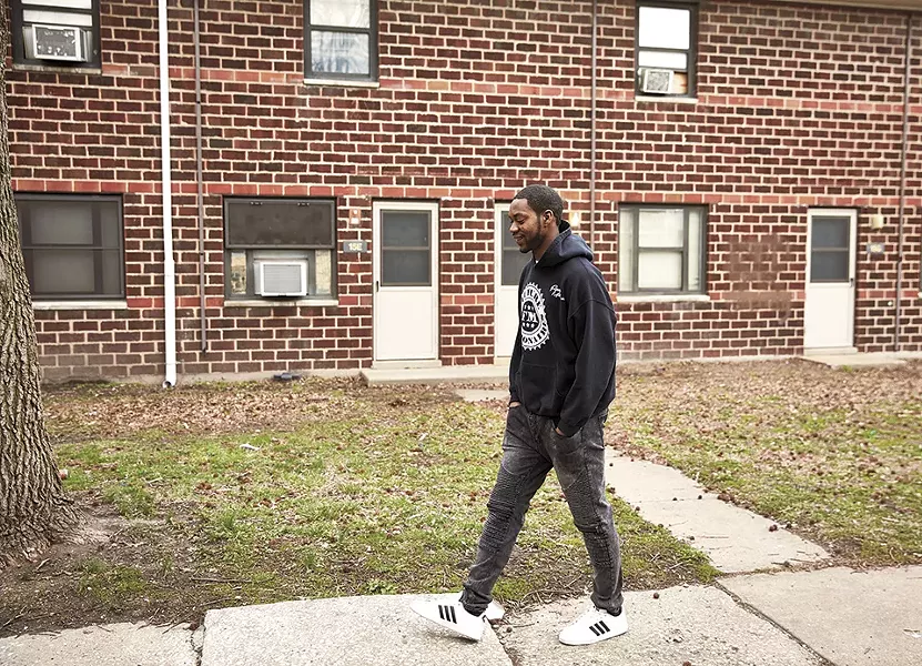 Liddell visiting the projects where he was raised: the Samuel Gompers Homes in East St. Louis. - THEO WELLING