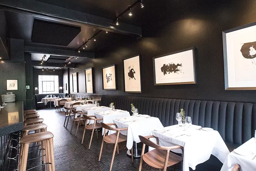 The restaurant is sexy in black and white. - MABEL SUEN