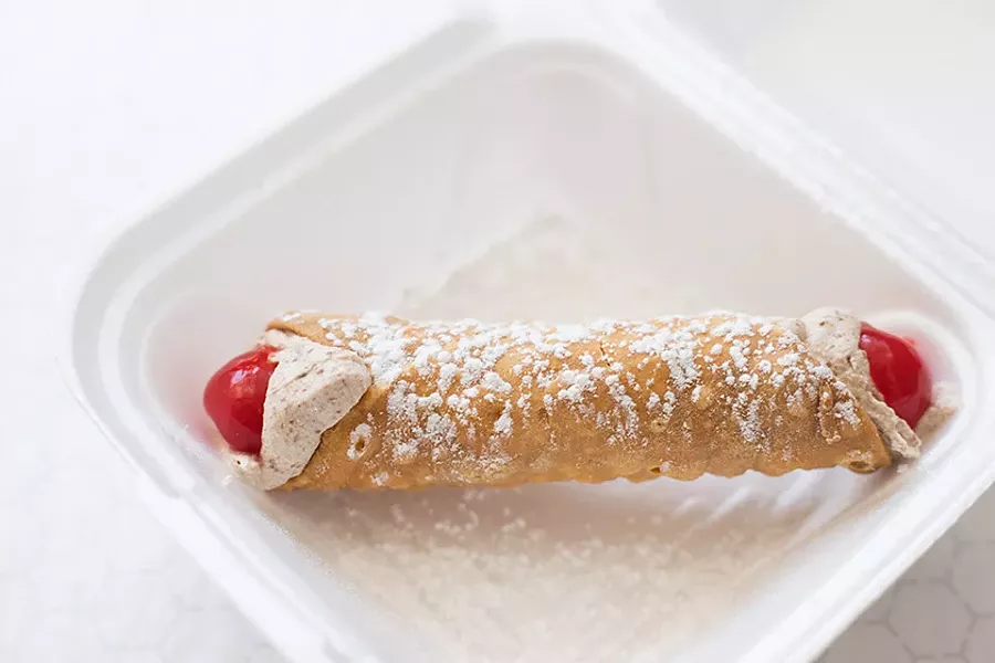 Housemade cannoli have ricotta-based chocolate and almond filling piped into a cannoli shell. - MABEL SUEN