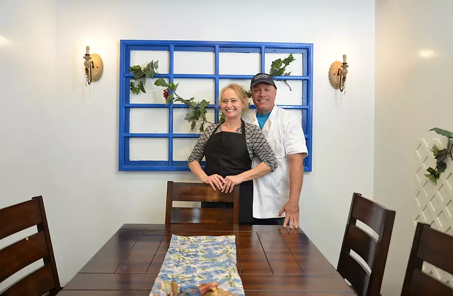 Greek Kitchen owners Lisa Nichols and Joe Kandel moved their restaurant closer to the city and found a "50-fold" increase in job responses. - TOM HELLAUER