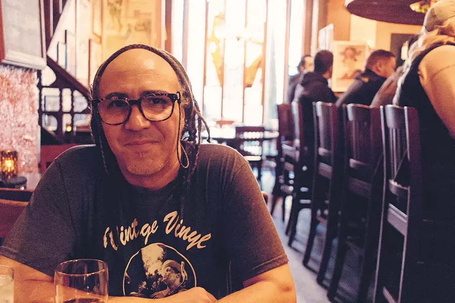Bartender-for-hire Doug Morgan invented a shot that’s downed around the world. - RYAN GINES
