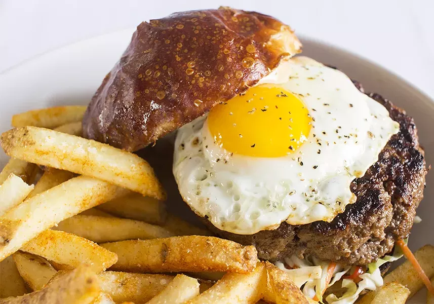 The "Wagyu Bulgogi Burger" brilliantly combines the restaurant's two cuisines. - PHOTO BY MABEL SUEN