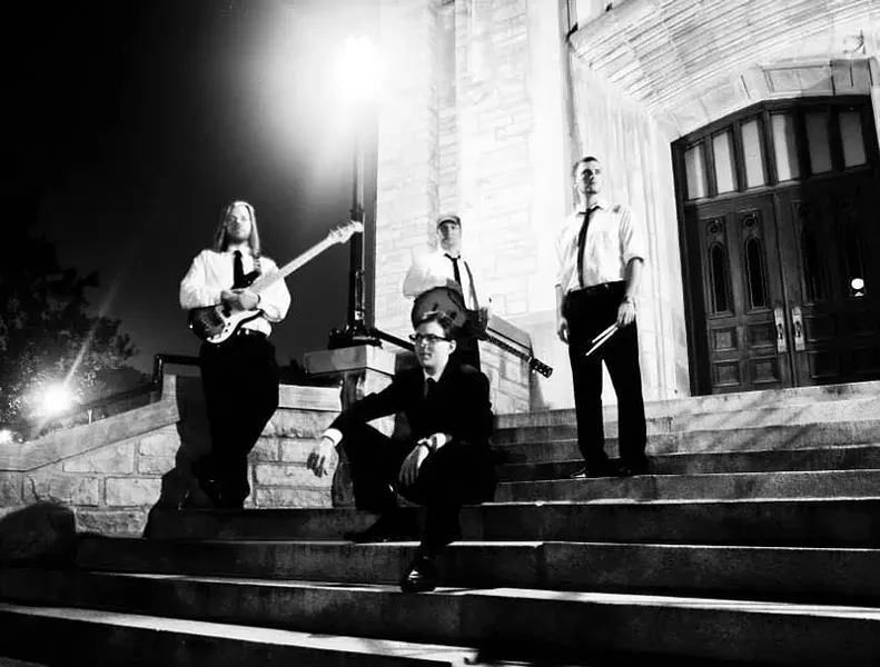 Charlie Brumley, center, with the core of the Educated Guess. - PHOTO BY ANGELA VINCENT