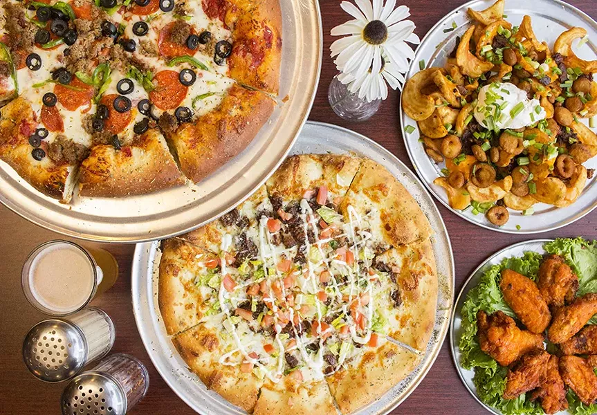 A selection of dishes from the Sliced Pint: the "Humble Pie," "Jane's Addiction," loaded fries and hot wings. - PHOTO BY MABEL SUEN