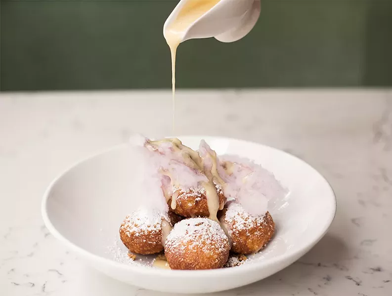 Gooey butter donuts try for a new spin on the St. Louis classic. - MABEL SUEN