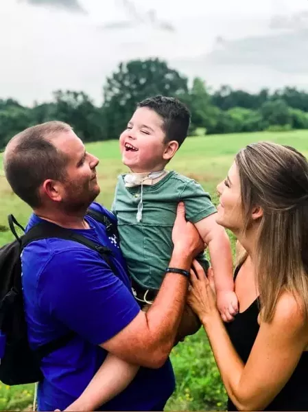 Robert and Stephanie Stanley with their “multi-millionaire man” Payton. - COURTESY STANLEY FAMILY