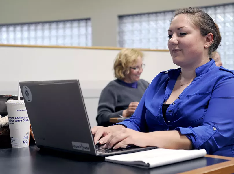 Java student Erin DeVires visits the LaunchCode Mentor Center in St. Louis every week to meet with her CoderGirl mentors and improve her coding skills. - PHOTO BY KELLY GLUECK