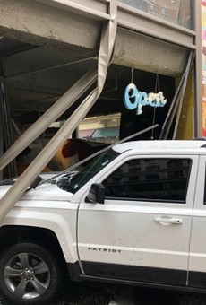 A Jeep slammed through the front windows of Bailey's Range on Saturday morning.