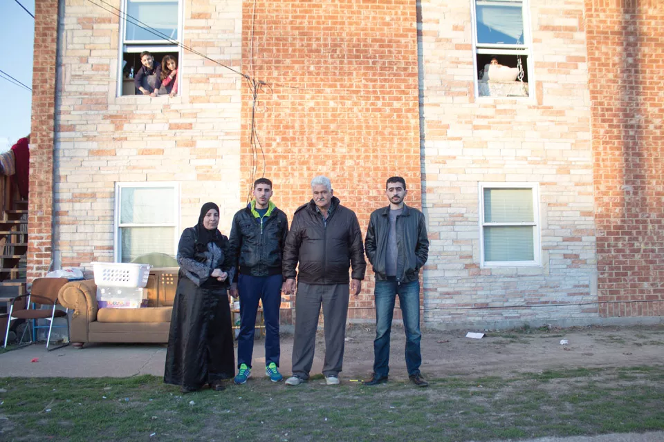 Iman Alkrad, far left, with her sons Abdal and Mohammed and husband Ammar. - SARA BANNOURA