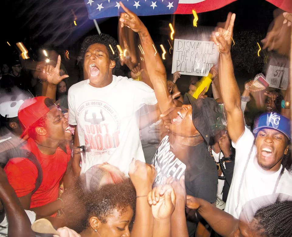 Davis co-directed the documentary Whose Streets? not long before beginning Darker Gods. “One is entrenched in the reality of what was going on, - and one is completely negating that reality and creating a new one.” - COURTESY OF MAGNOLIA PICTURES