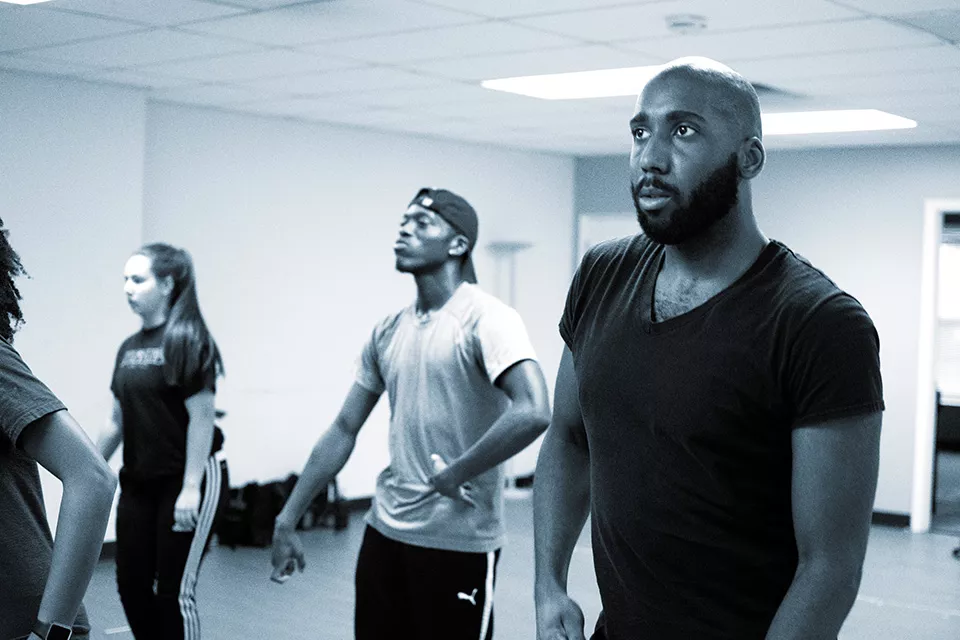 The dancers work through a scene. - ANDY PAULISSEN