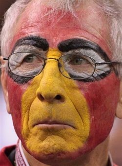 Just don't paint your face like this guy. It's too pathetic. - IMAGE VIA
