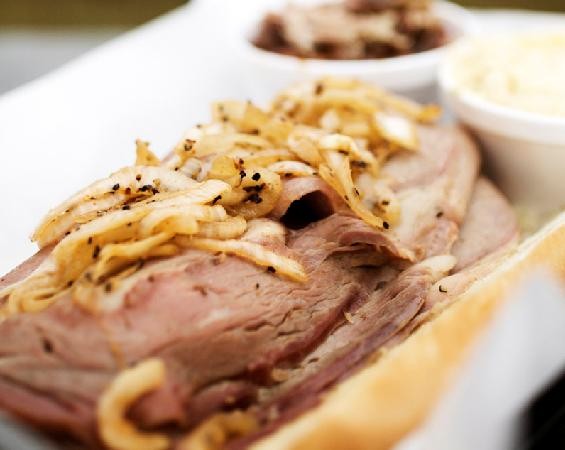 The prime rib sandwich, with smoked onions, at Bogart's Smokehouse - JENNIFER SILVERBERG