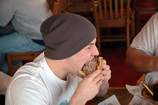 O'Connor sinks his teeth into the Fuddruckers five-pound burger. - PHOTO: ANDREW MARK VEETY