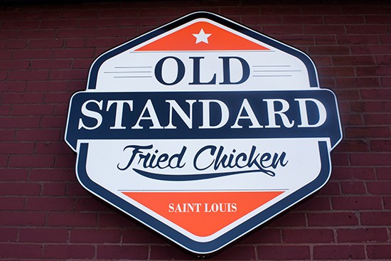 The Old Standard logo.