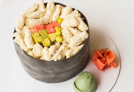 One of Soraci's signature cakes in the shape of sushi.