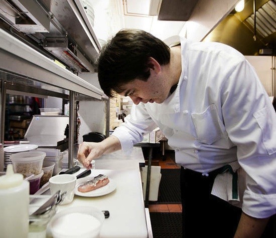 Chef Jonathan Olson in the kitchen of Market Grill - JENNIFER SILVERBERG