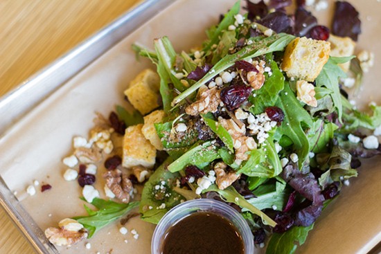 House salad with spring mix, croutons, dried cranberries, goat cheese, roasted pecans and balsamic vinaigrette.
