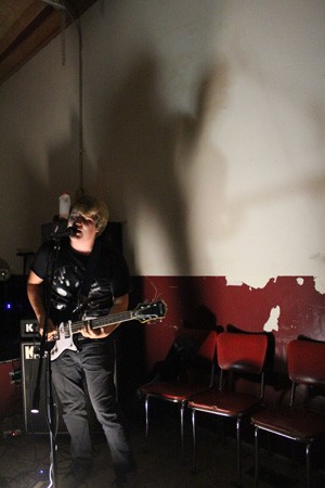 Guitarist and Vocalist Josh Jenkins blasts through a set at Illegal Tone on Belleville Main St. - MABEL SUEN
