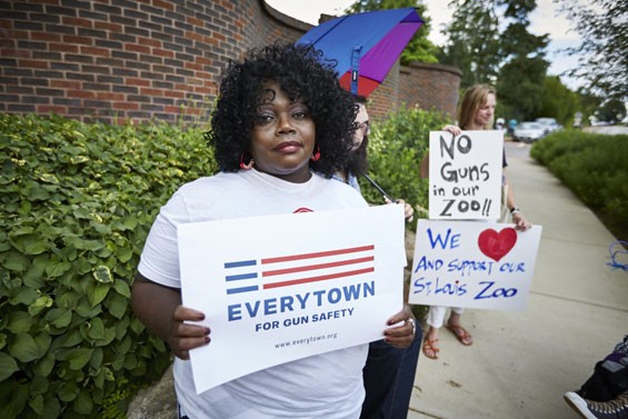 A protester outside the St. Louis Zoo - PHOTO BY THEO WELLING