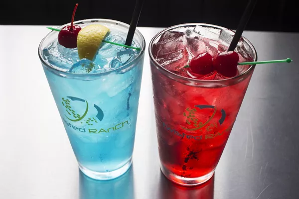 The "Bleed Blue" and "Cardinal Red" cocktails. - MABEL SUEN
